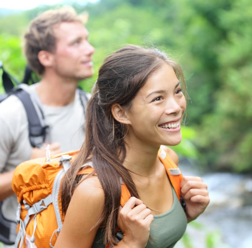 A man and woman enjoying a hike