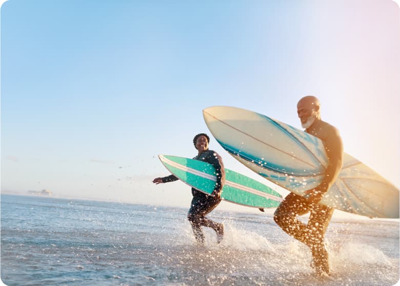 Two surfers on the beach